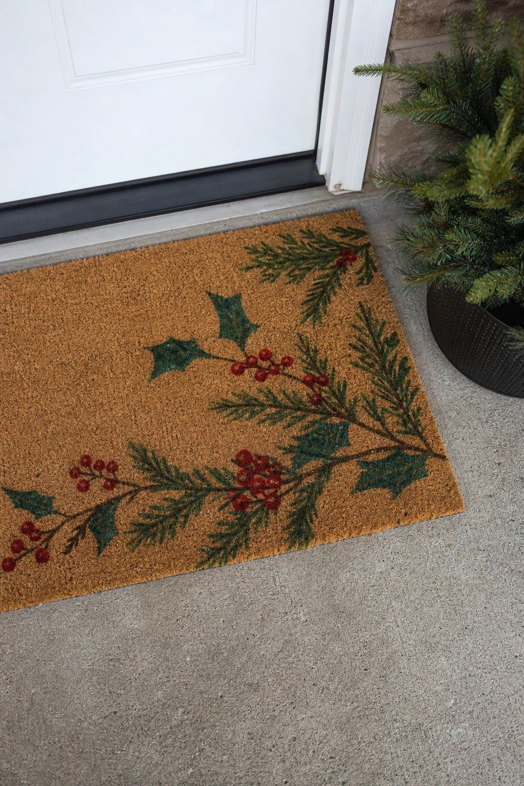 Front door Christmas decoration idea: a festive coir doormat