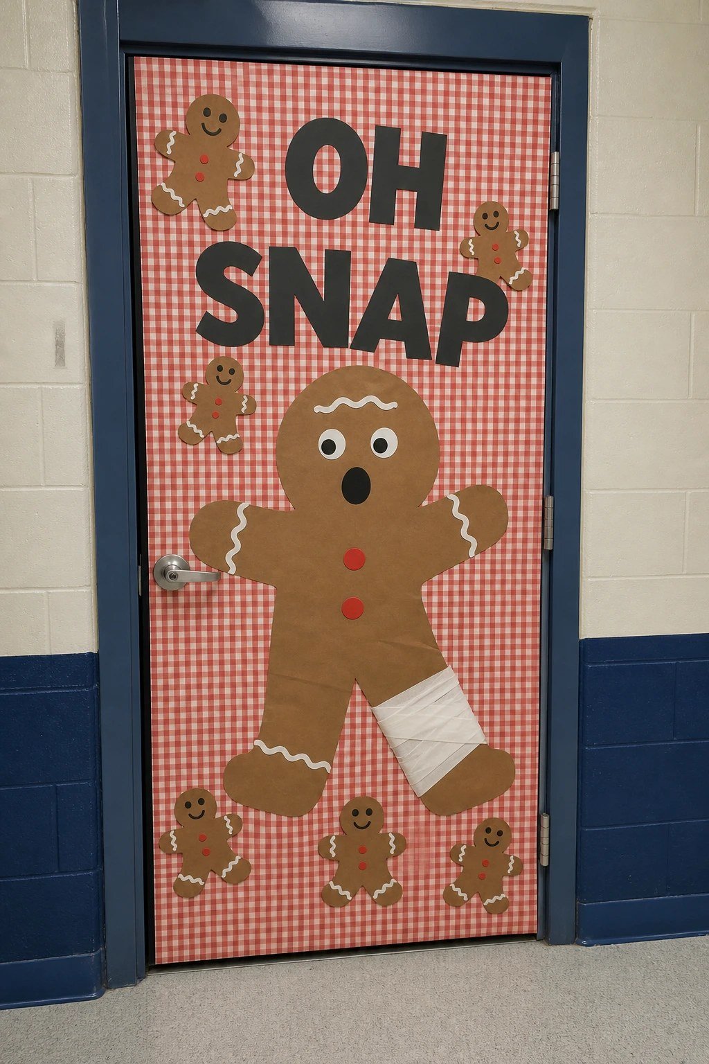 A classroom door with a paper gingerbread man with a bandaged leg