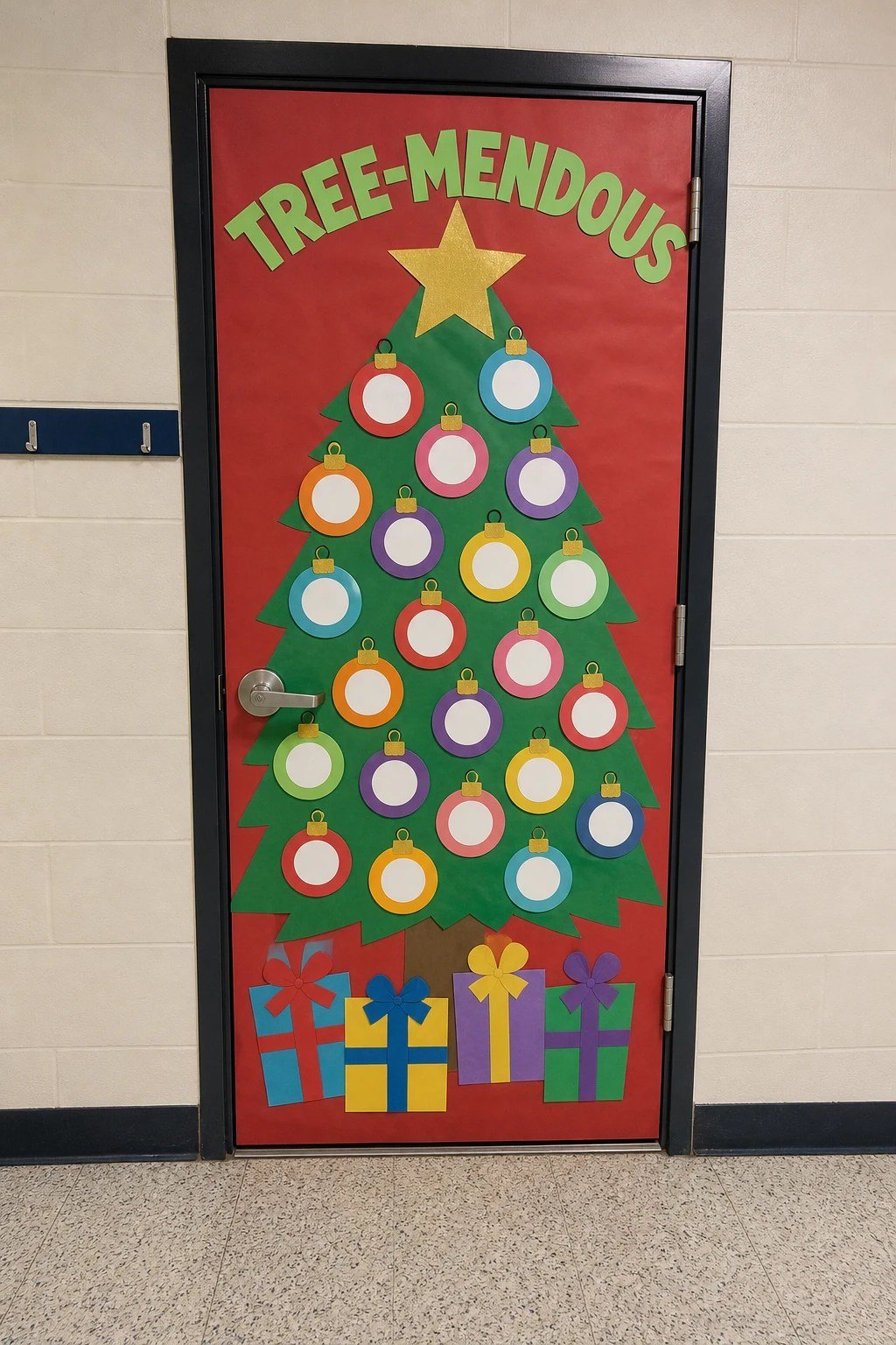 A classroom door with a big paper tree covered in name ornaments